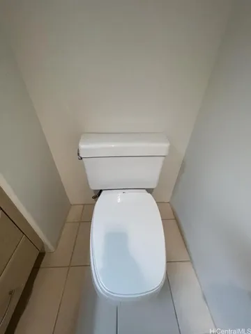 a close view of a toilet in a bathroom