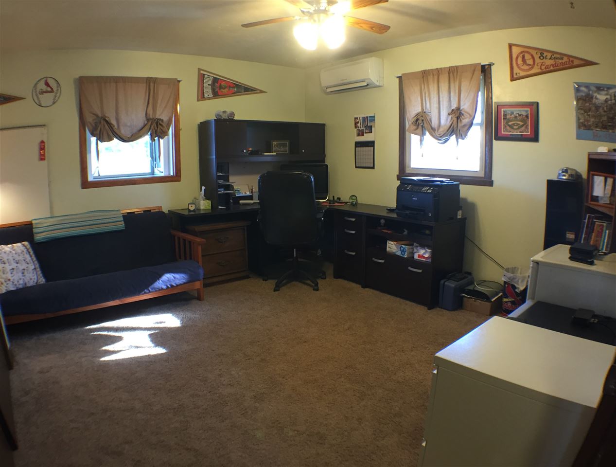 11578 Comly Rd. Winnebago, IL 61088 - Photo 11 of 23 a bedroom with furniture and a window