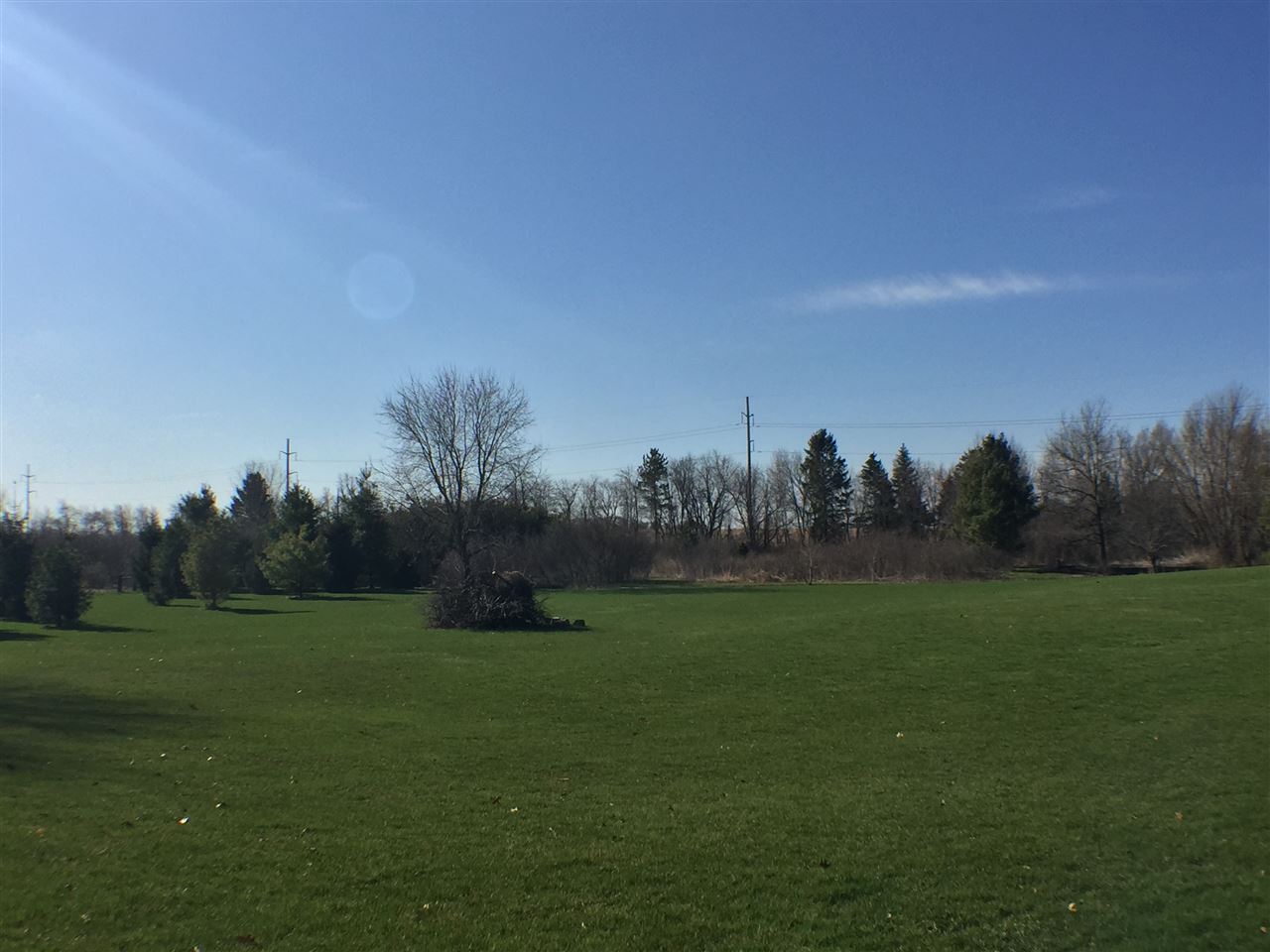 11578 Comly Rd. Winnebago, IL 61088 - Photo 21 of 23 a view of grassy field with trees