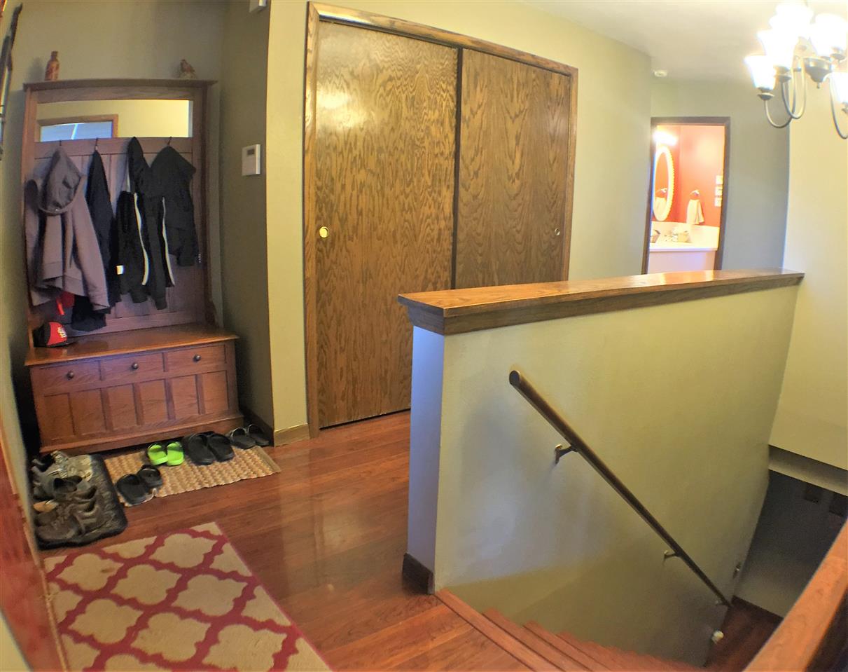 11578 Comly Rd. Winnebago, IL 61088 - Photo 4 of 23 a view of walk in closet with clothes and shoes