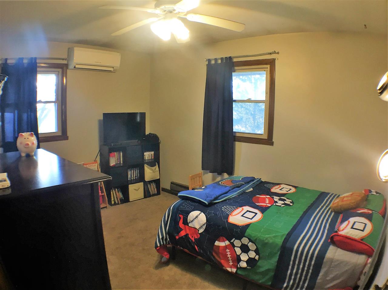 11578 Comly Rd. Winnebago, IL 61088 - Photo 10 of 23 a bedroom with a bed and a lamp on dresser