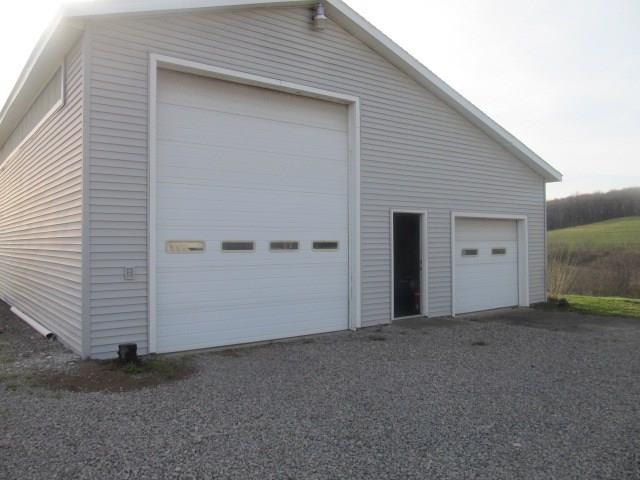 266 Aggas Road Butler, PA 16001 - Photo 10 of 16 This huge garage has so many uses! Complete with electric and water!