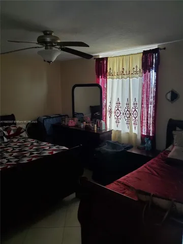 a kitchen with a sink and a stove top oven