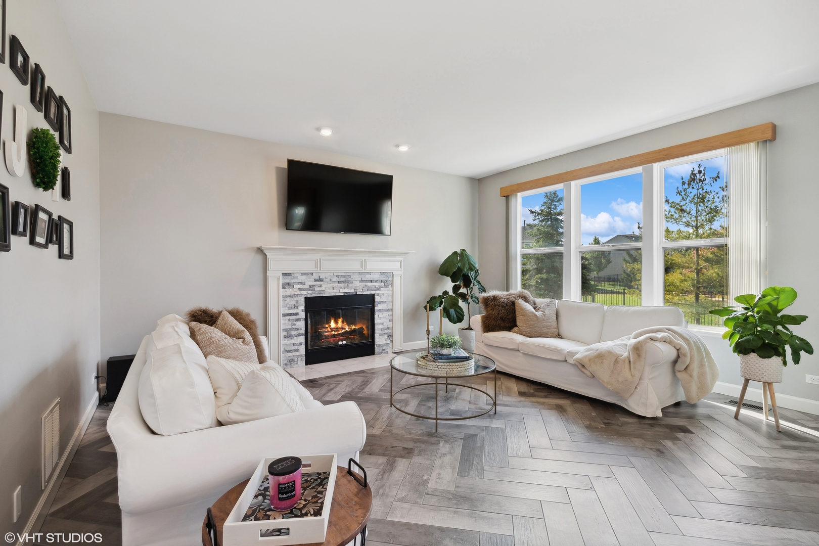 280 Shelbourne Road Volo, IL 60073 - Photo 8 of 24 a living room with furniture fireplace and a large window