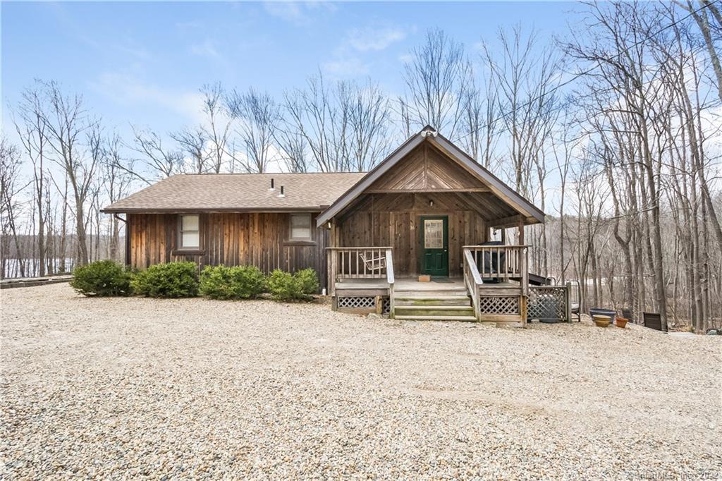 36 Graham Road Ashford, CT 06278 - Photo 1 of 1 a front view of a house with a yard