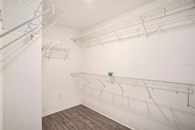 a view of a room with racks on the wall