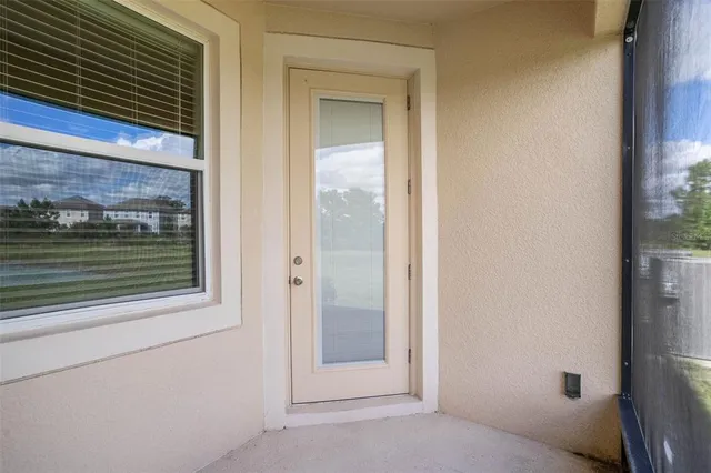 a view of a small space window and a fireplace