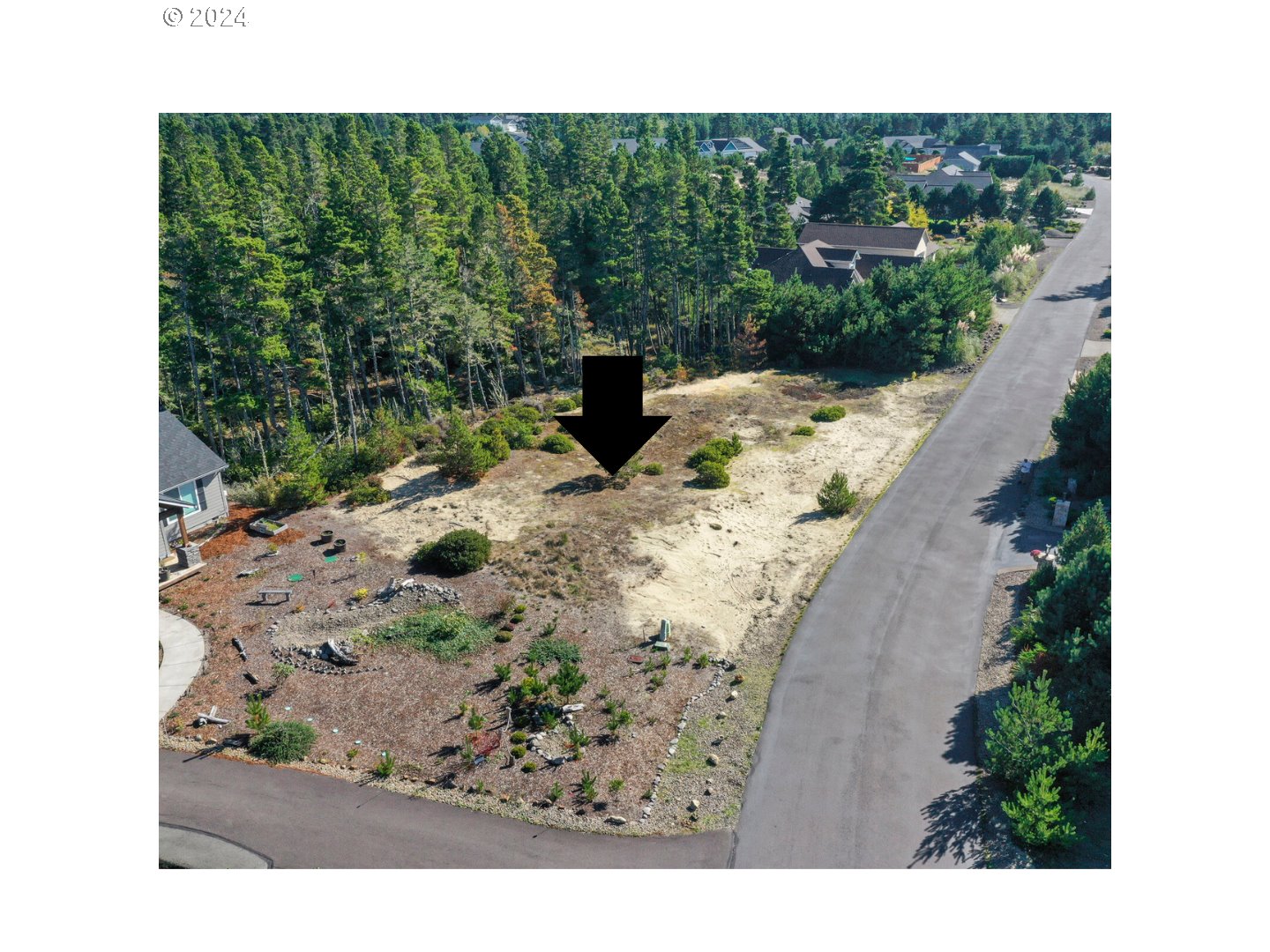 Lakepoint Drive, Unit 33 Florence, OR 97439 - Photo 2 of 9 a view of a backyard with plants