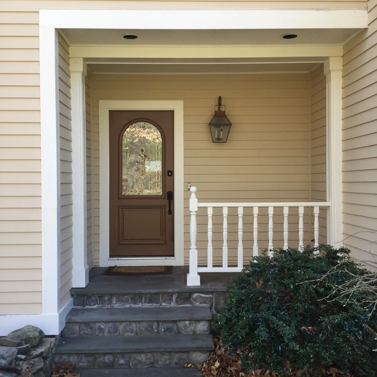 2 Ryer Lane Middleton, MA 01949 - Photo 16 of 16 a front view of a house with garden