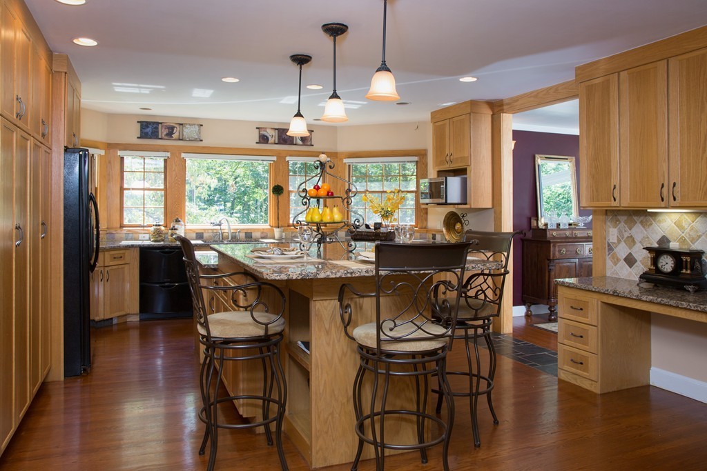 2 Ryer Lane Middleton, MA 01949 - Photo 2 of 16 a view of a dining room with furniture window and wooden floor