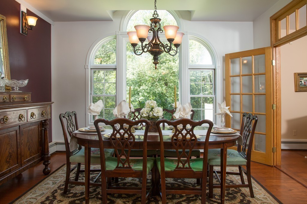 2 Ryer Lane Middleton, MA 01949 - Photo 6 of 16 a view of a dining room with furniture window and outside view