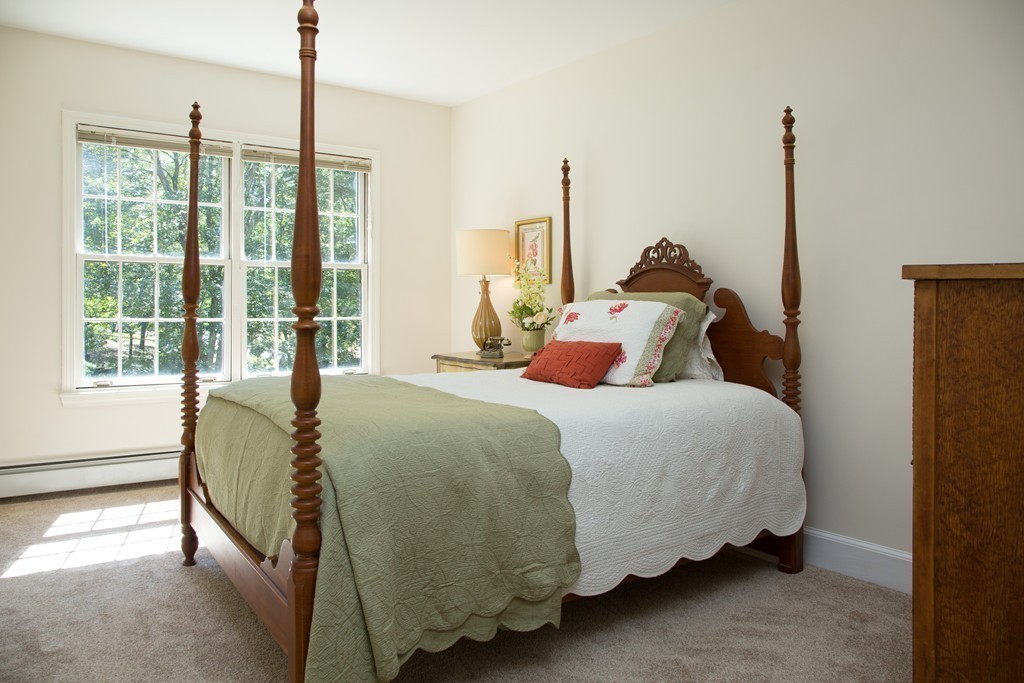 2 Ryer Lane Middleton, MA 01949 - Photo 10 of 16 a bedroom with a bed and large window