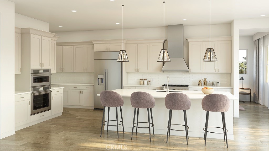 1112 West Empress Drive Glendora, CA 91741 - Photo 2 of 5 a kitchen with stainless steel appliances granite countertop a kitchen island a stove and a cabinets