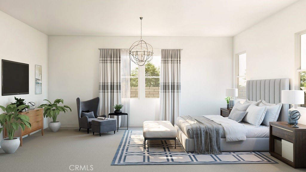 1112 West Empress Drive Glendora, CA 91741 - Photo 3 of 5 a bedroom with furniture and a chandelier