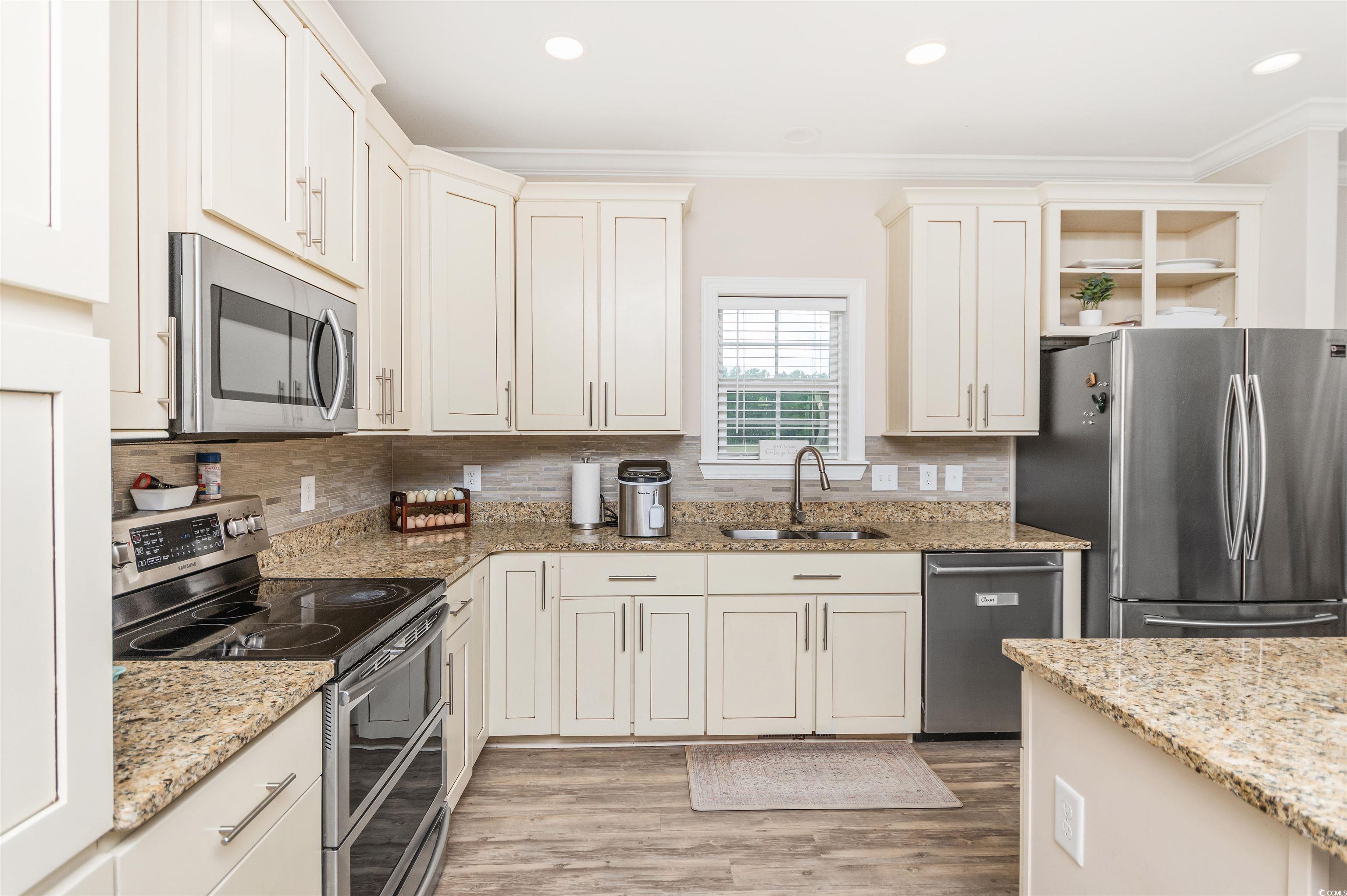 510 Council Bluff Road Longs, SC 29568 - Photo 12 of 40 Kitchen with sink, hardwood / wood-style flooring,
