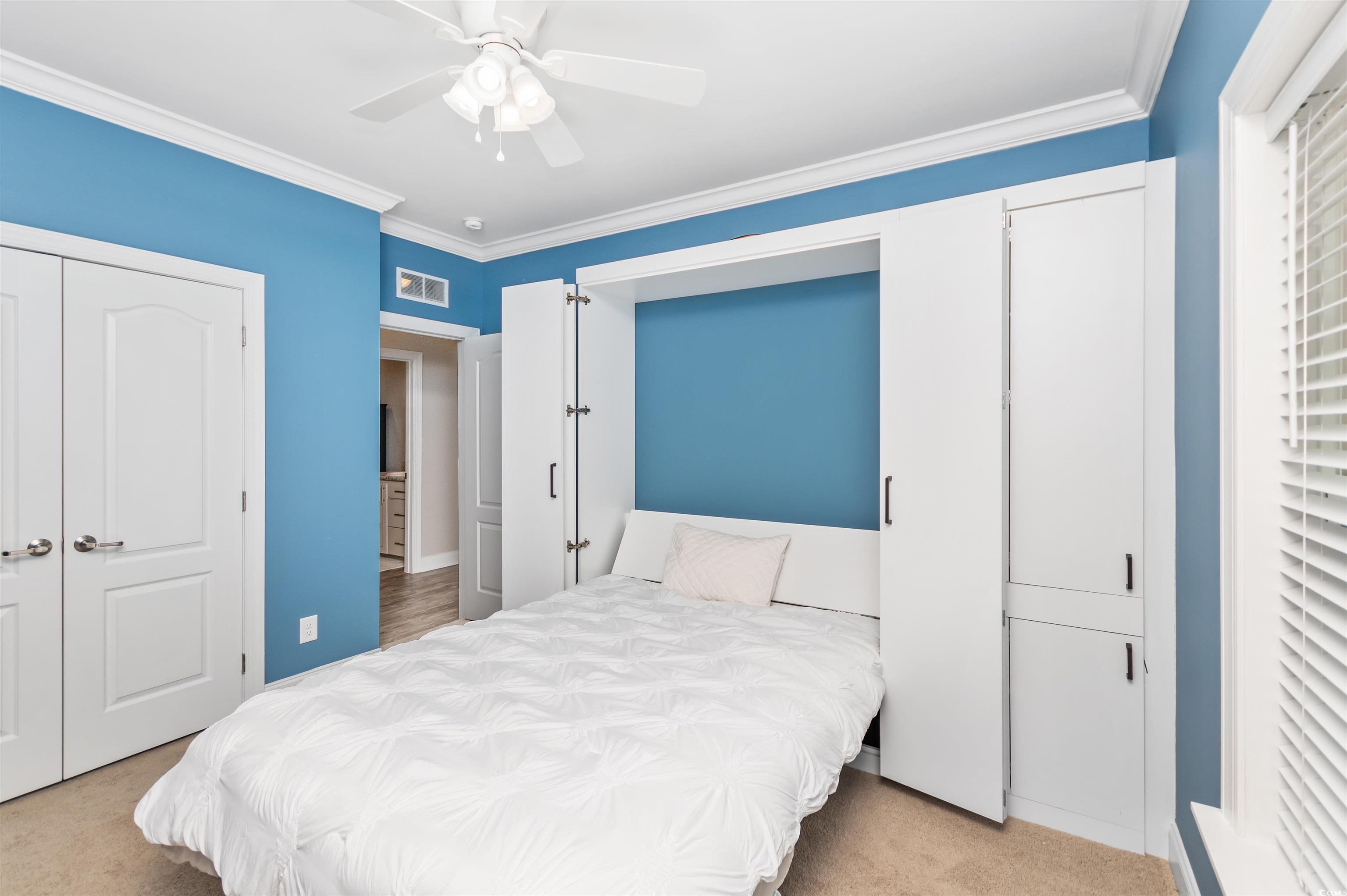 510 Council Bluff Road Longs, SC 29568 - Photo 20 of 40 Carpeted bedroom featuring ceiling fan and ornamen