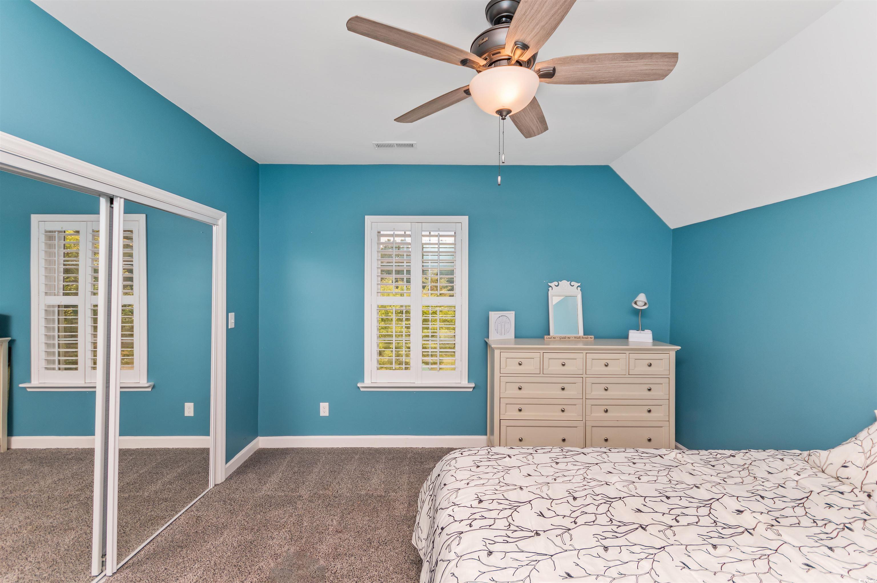 510 Council Bluff Road Longs, SC 29568 - Photo 28 of 40 Bedroom featuring lofted ceiling, carpet, a closet