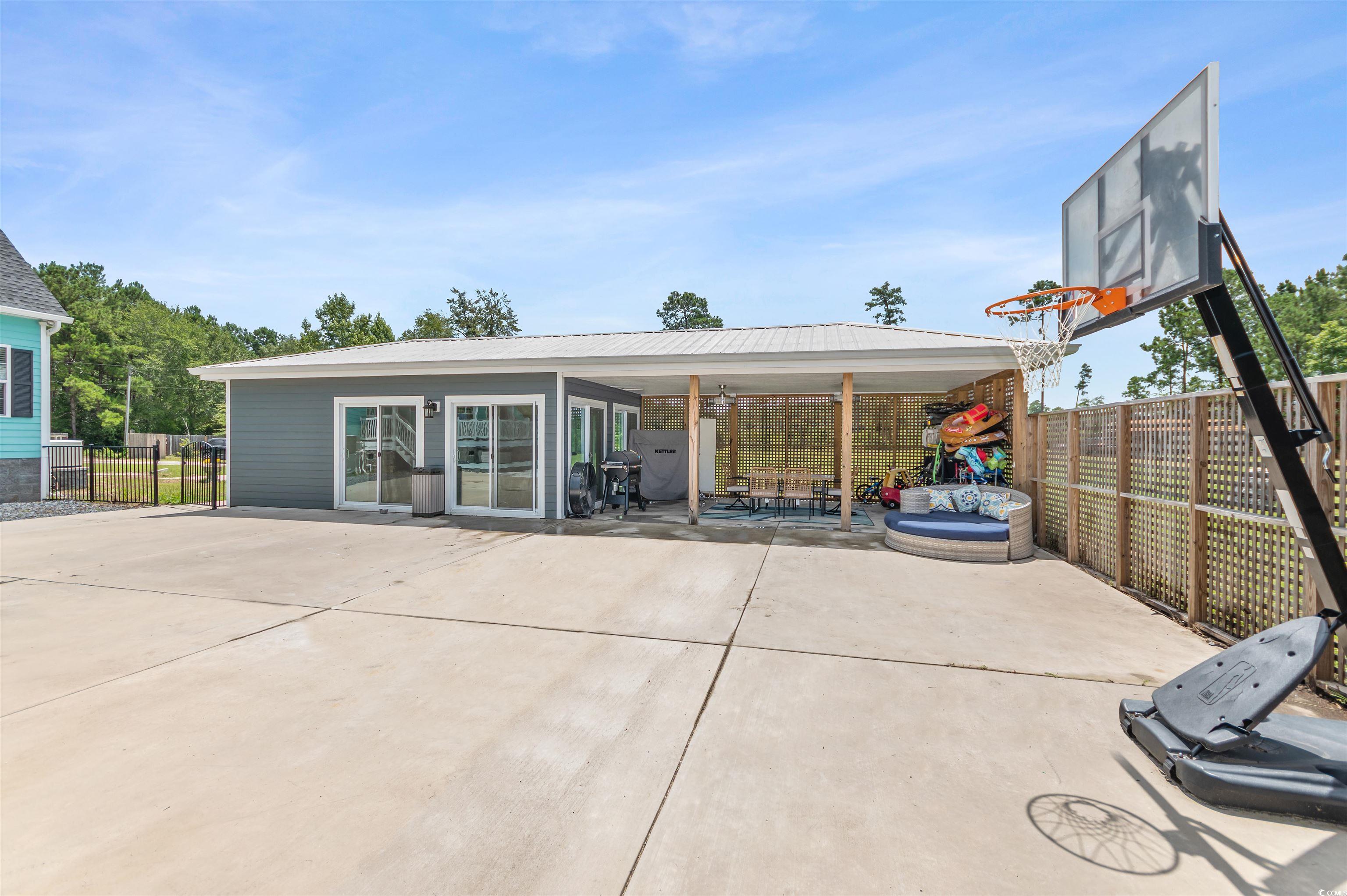 510 Council Bluff Road Longs, SC 29568 - Photo 35 of 40 Back of house with a patio
