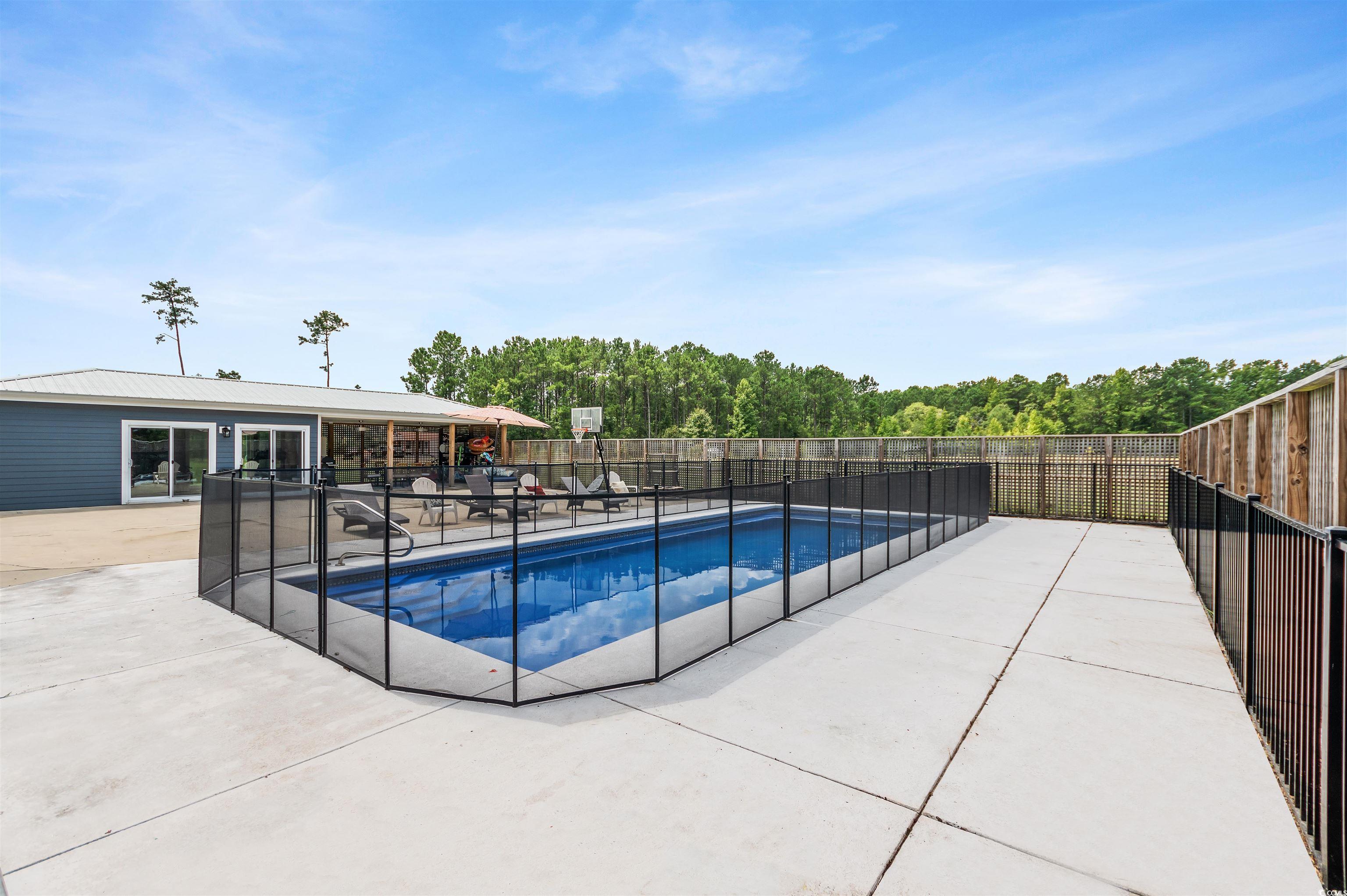 510 Council Bluff Road Longs, SC 29568 - Photo 38 of 40 View of pool featuring a patio area
