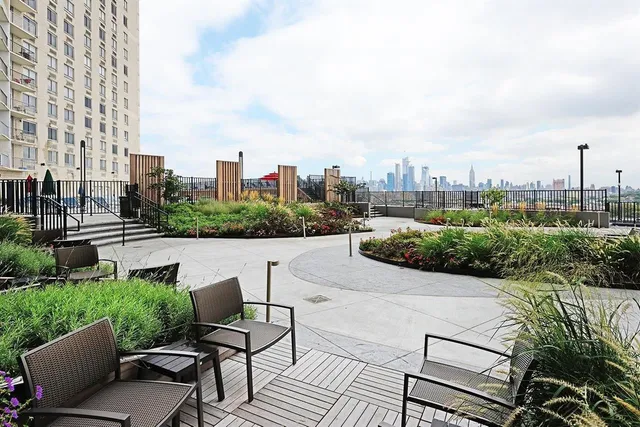 a view of a terrace with sitting area