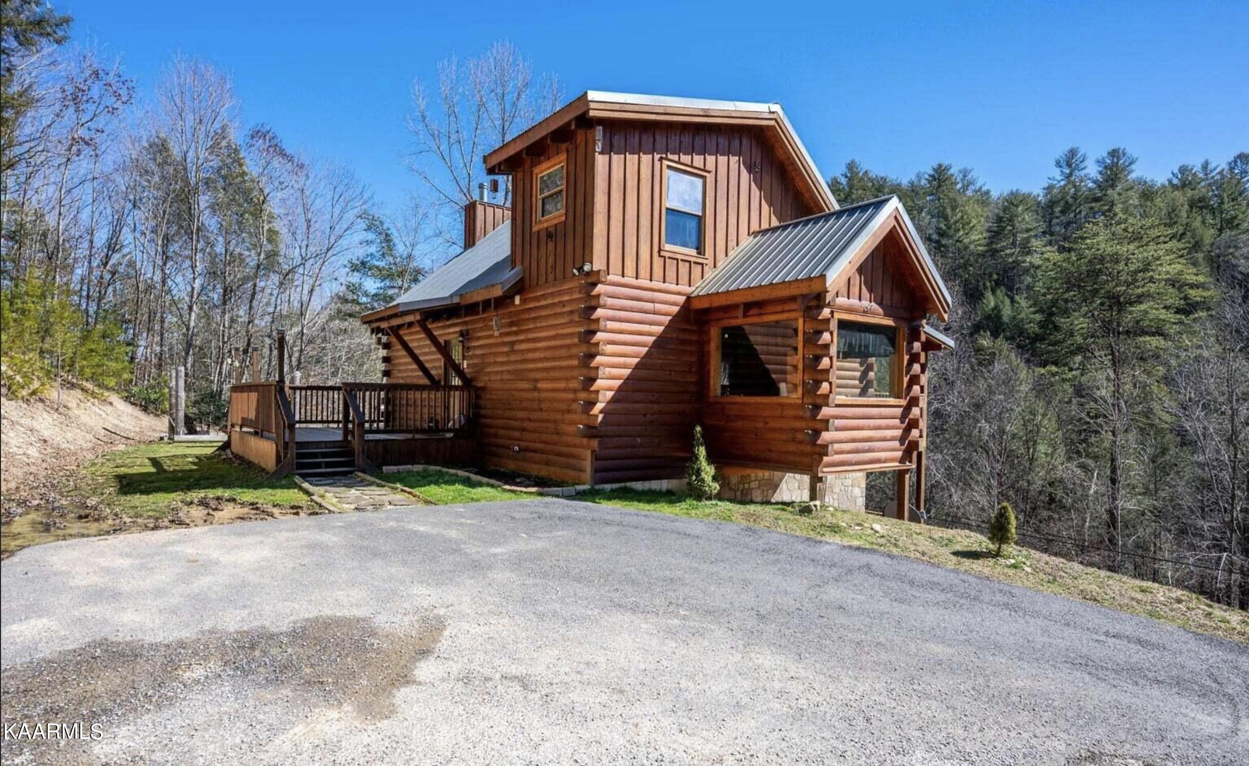 3943 Henry Town Road Sevierville, TN 37876 - Photo 1 of 21 Front of cabin