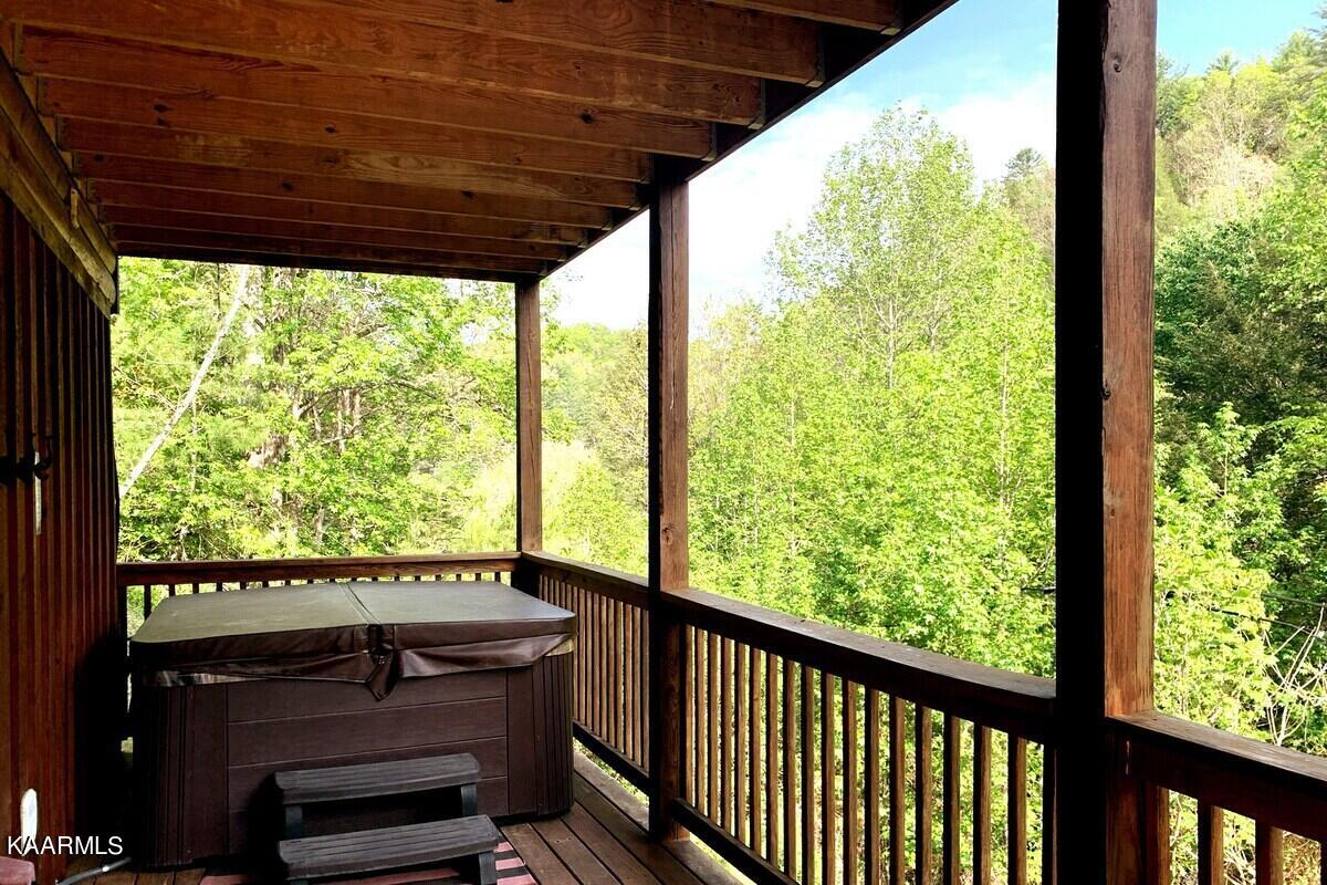 3943 Henry Town Road Sevierville, TN 37876 - Photo 19 of 21 Back deck with hot tub