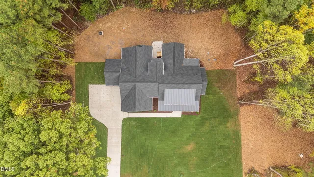 a house with trees in front of it