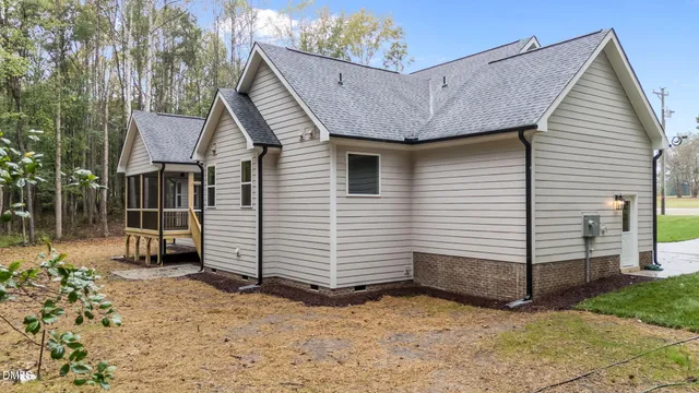 a front view of a house with a garage