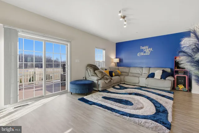 a bed room with furniture and a window