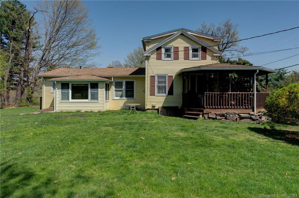 260 Prospect Street Suffield, CT 06078 - Photo 1 of 1 a front view of a house with a garden