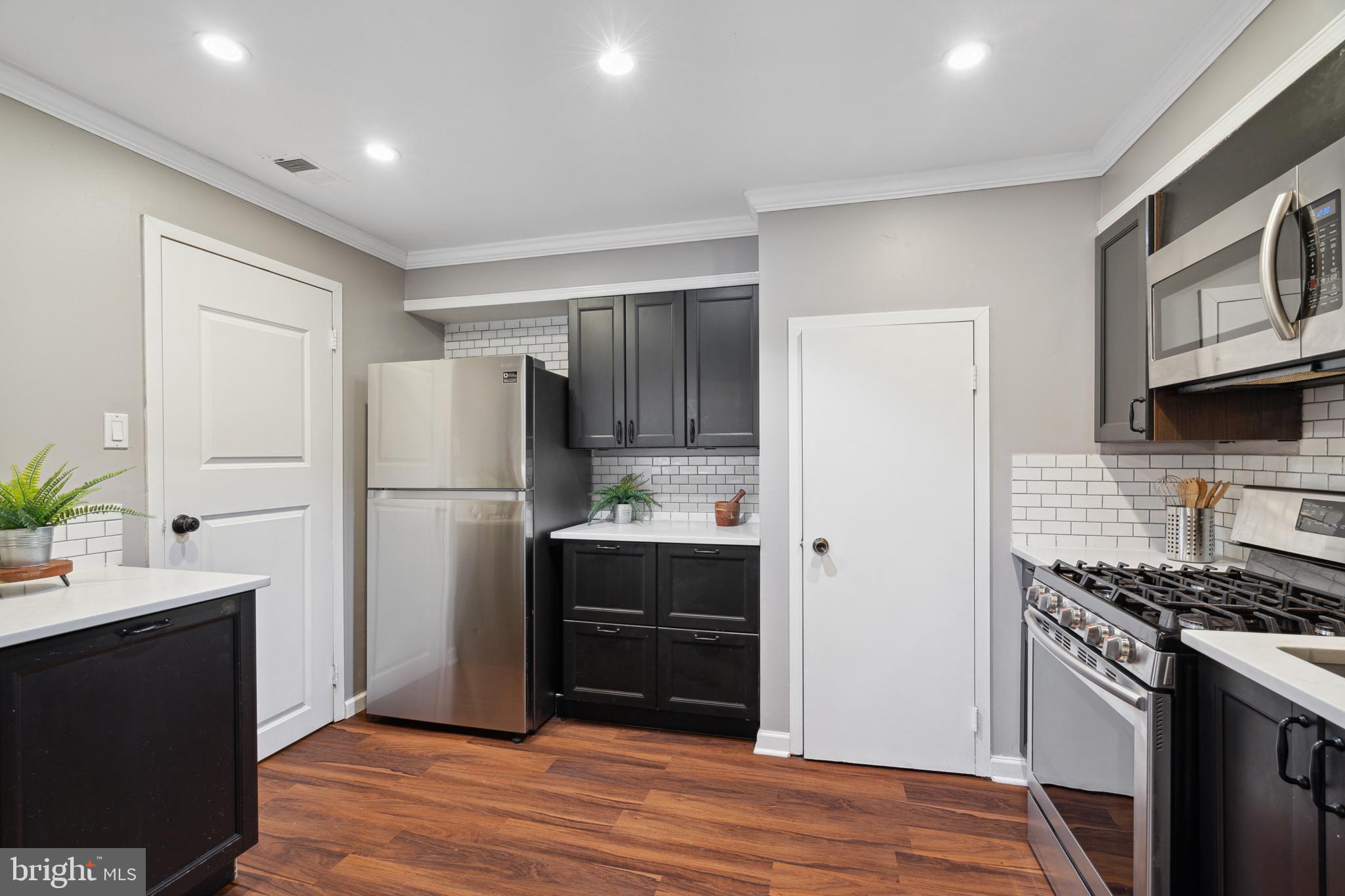 3 Hamilton Circle Philadelphia, PA 19130 - Photo 12 of 41 Access your backyard from the door in the kitchen.