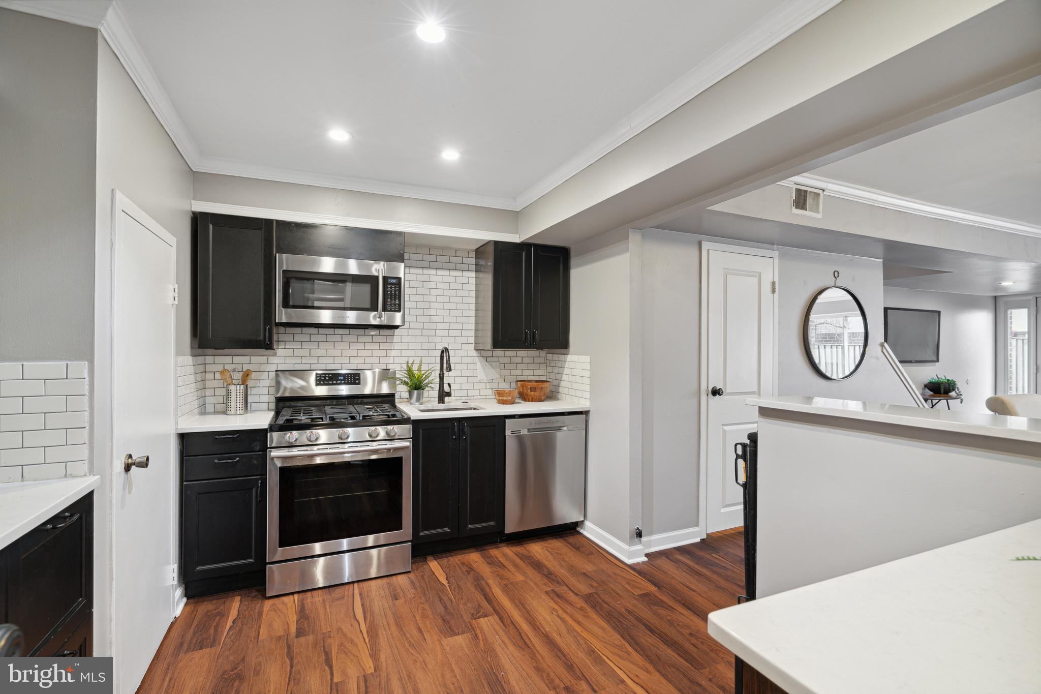 3 Hamilton Circle Philadelphia, PA 19130 - Photo 13 of 41 Your updated kitchen with white subway tile.
