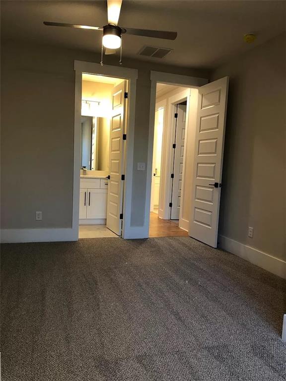 131 West Putnam Ferry Road Woodstock, GA 30189 - Photo 12 of 22 a view of empty room with window