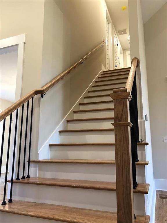 131 West Putnam Ferry Road Woodstock, GA 30189 - Photo 16 of 22 a view of entryway and hall with wooden floor