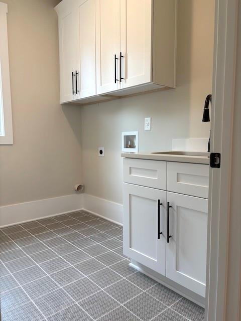 131 West Putnam Ferry Road Woodstock, GA 30189 - Photo 19 of 22 a view of white cabinets and sink