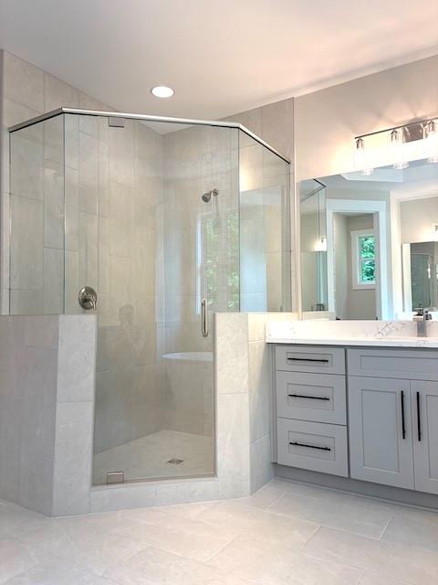 131 West Putnam Ferry Road Woodstock, GA 30189 - Photo 21 of 22 a bathroom with a shower sink and mirror
