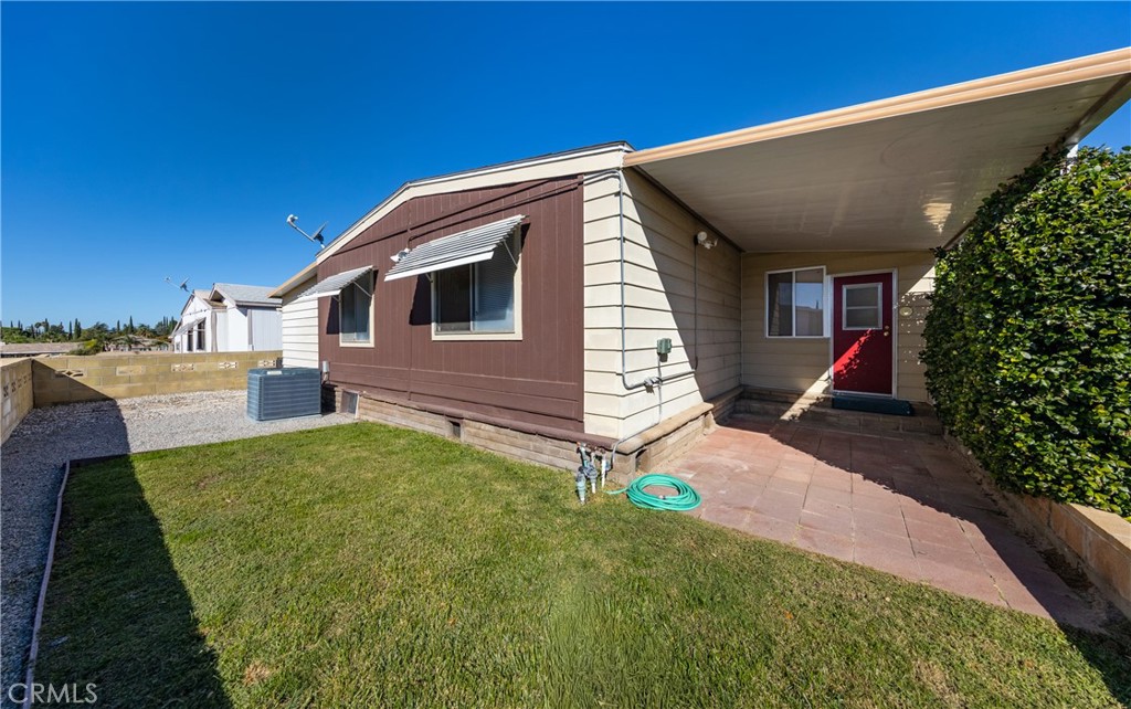 4133 West Wilson Street, Unit 168 Banning, CA 92220 - Photo 21 of 25 a view of backyard of house
