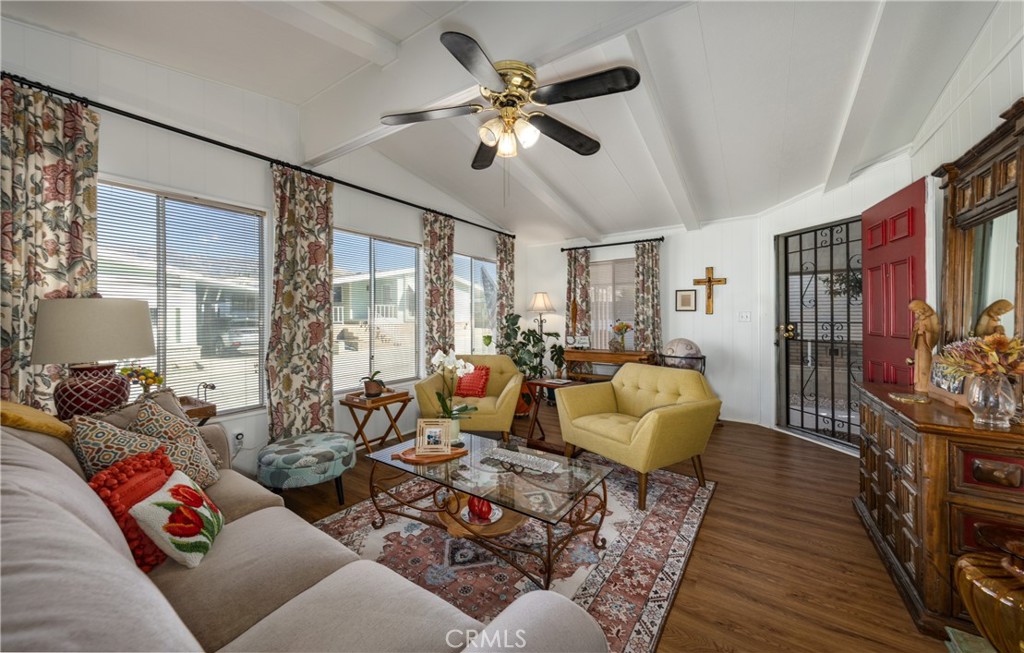 4133 West Wilson Street, Unit 168 Banning, CA 92220 - Photo 5 of 25 a living room with furniture and a large window