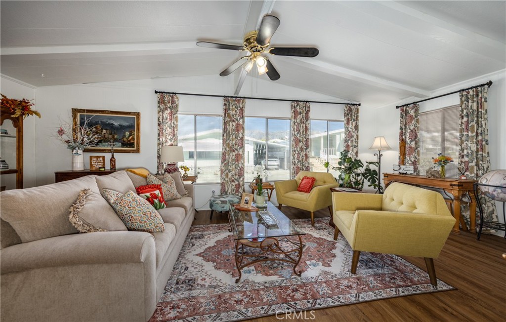 4133 West Wilson Street, Unit 168 Banning, CA 92220 - Photo 6 of 25 a living room with furniture and a large window