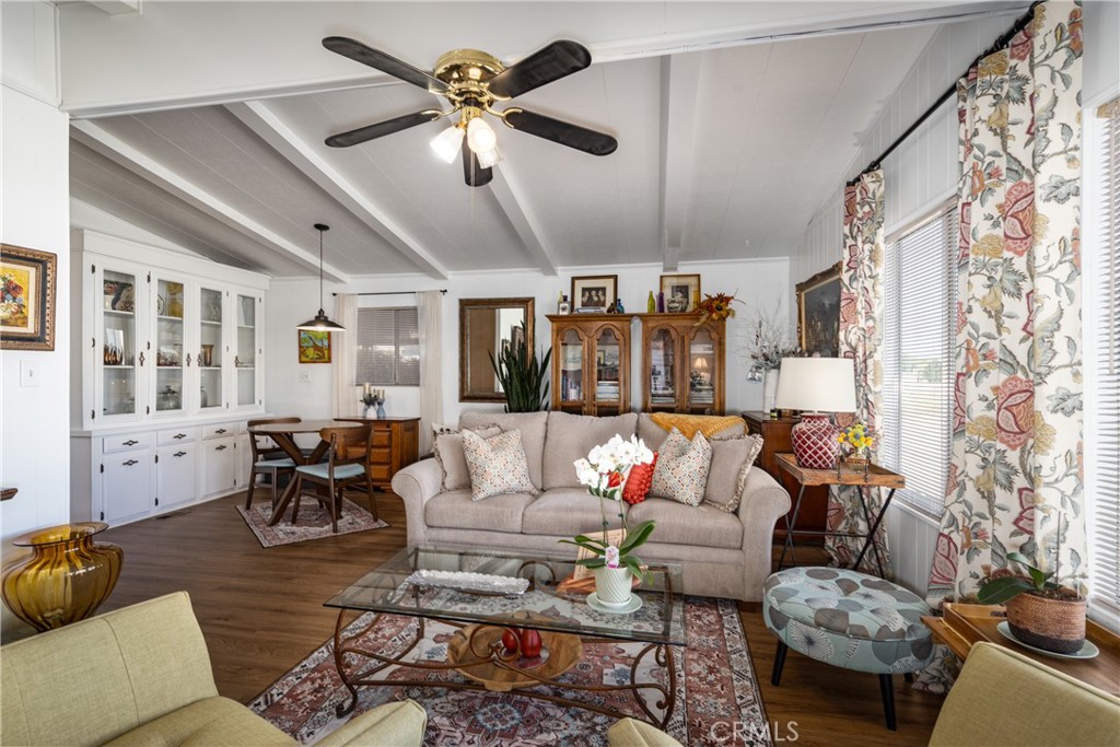 4133 West Wilson Street, Unit 168 Banning, CA 92220 - Photo 7 of 25 a living room with furniture and a large window