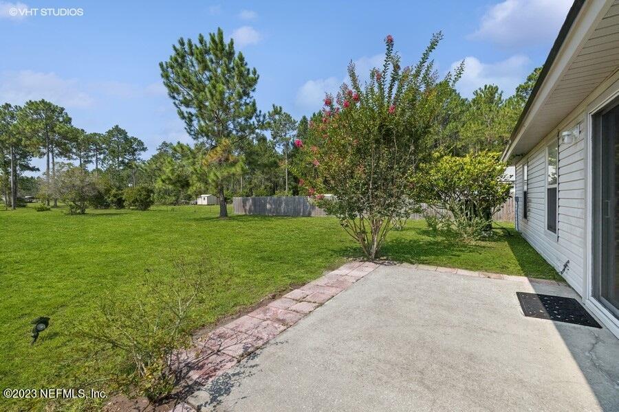 10695 Ford Road Bryceville, FL 32009 - Photo 23 of 46 Back patio