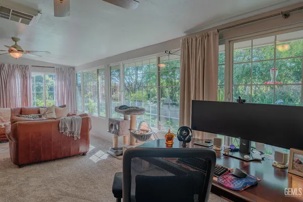 a bedroom with a bed and chair