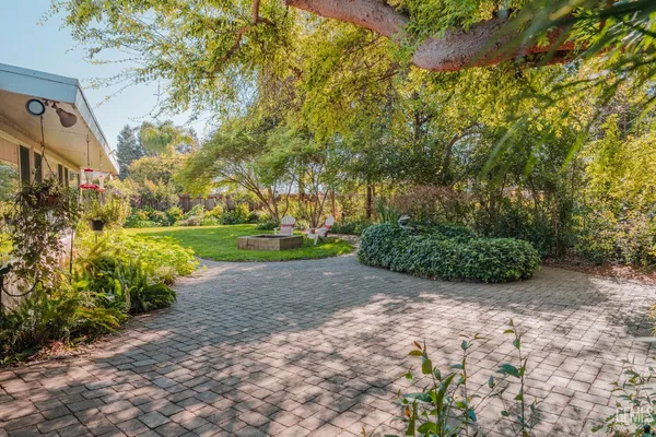 a view of swimming pool with a patio