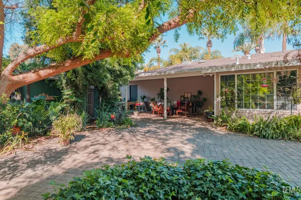 a backyard of a house with lots of green space