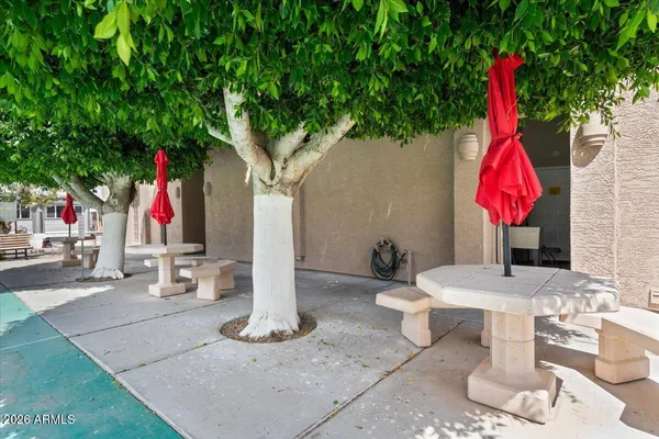 a backyard view with sitting space and outdoor seating