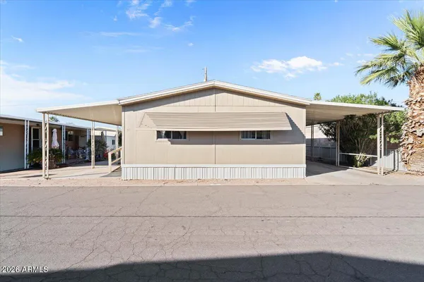 a front view of a house with a garage
