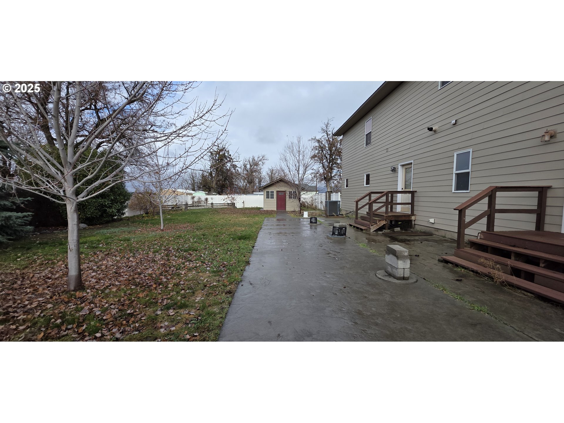 445 7th Street Northeast Irrigon, OR 97844 - Photo 19 of 24 a backyard of a house with garden barbeque oven and outdoor seating