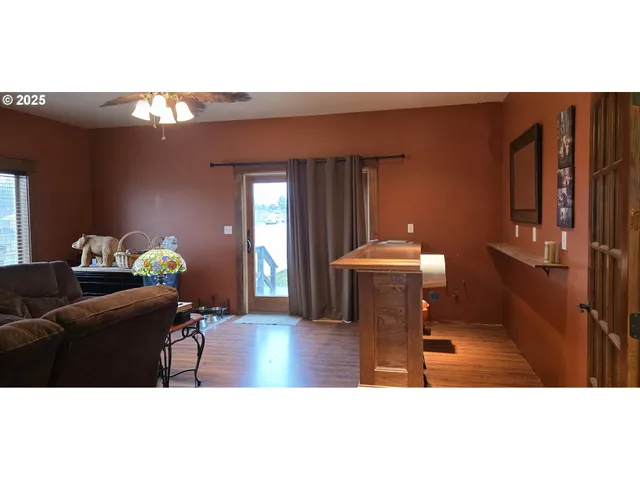 a living room with furniture a chandelier