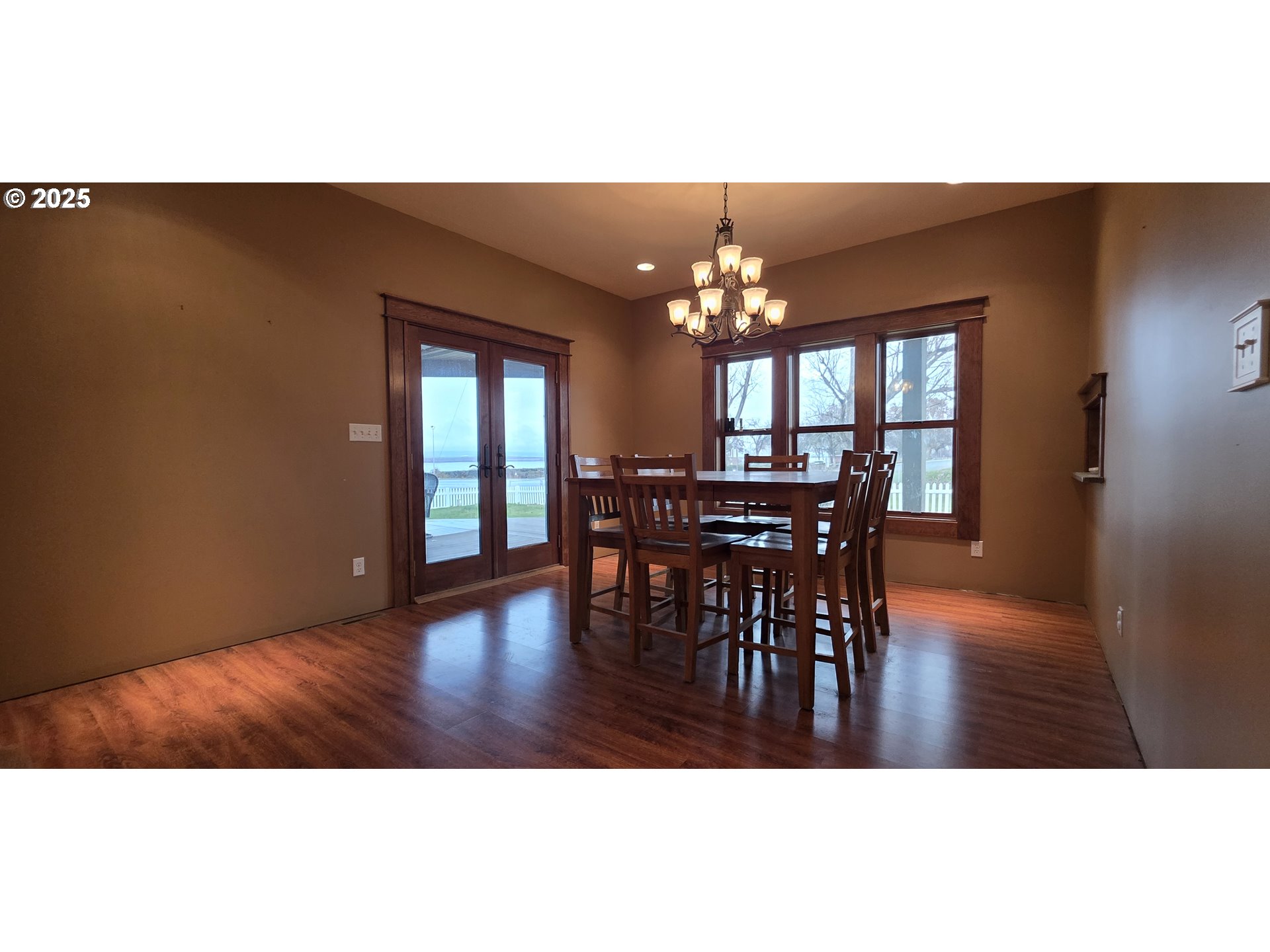 445 7th Street Northeast Irrigon, OR 97844 - Photo 7 of 24 a view of a dining room with furniture and chandelier