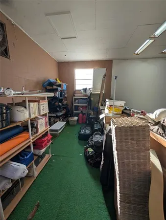 a bed room with a bed and a window